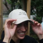 Trying on the cream cap