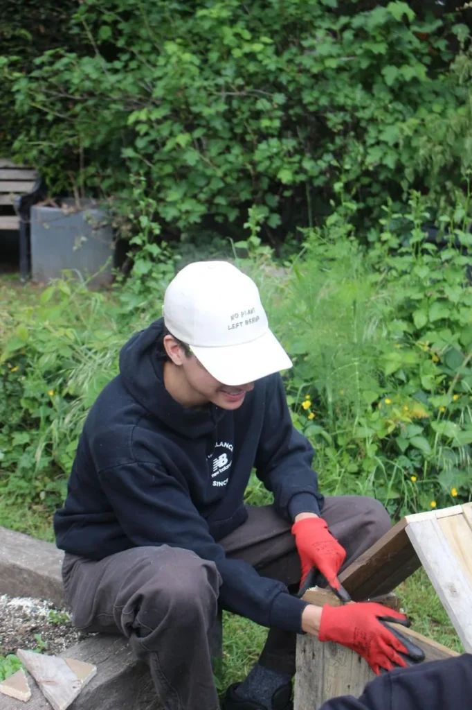 Wearing the cream cap at a build day