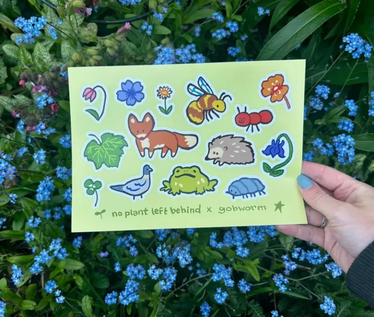 The City Scape sticker sheet held over flowers